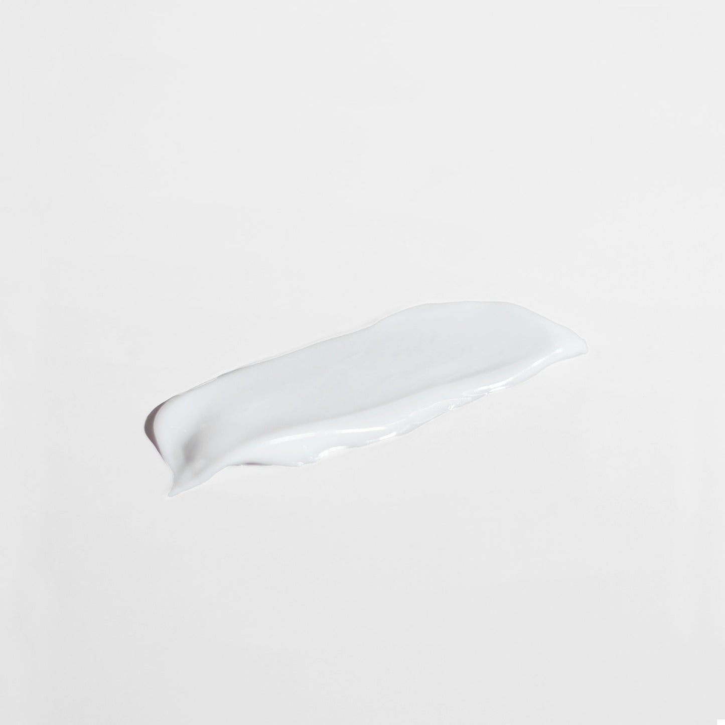 Smooth texture of Alpha Omega Vitality anti aging moisturizer for normal skin on a white background