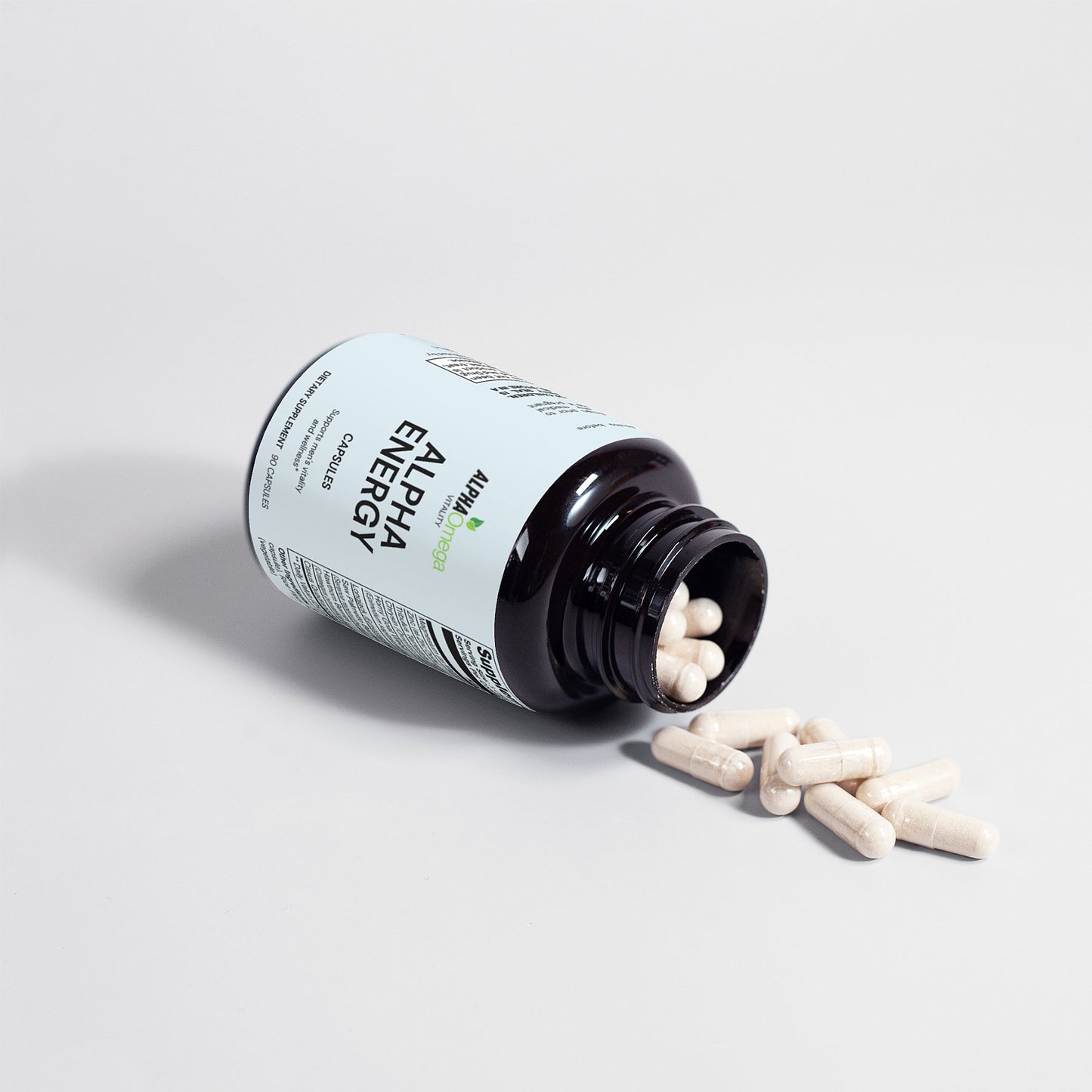 Alpha Omega Vitality Alpha Energy supplement bottle with capsules spilling out for enhanced vitality