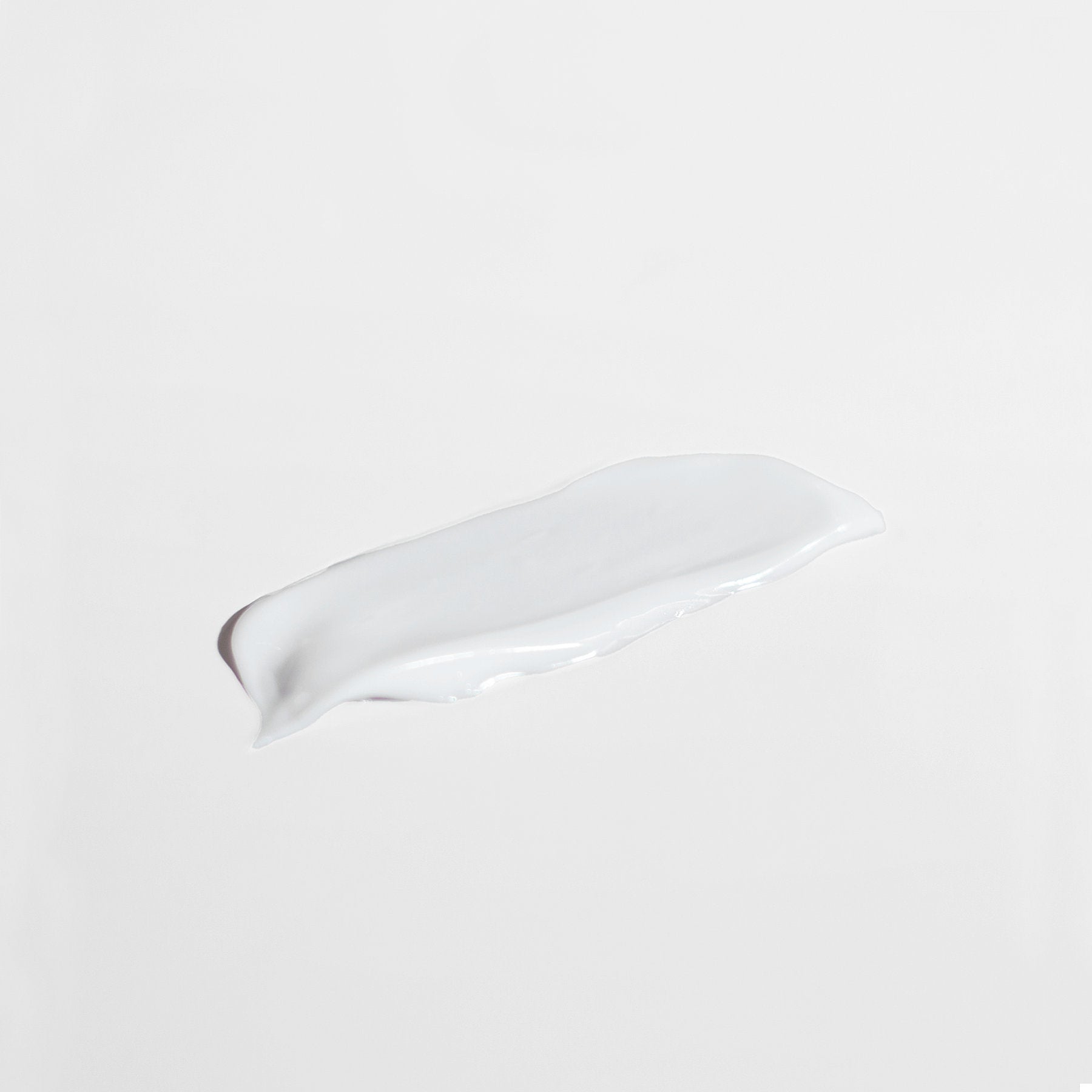 Smooth texture of Alpha Omega Vitality anti aging moisturizer for sensitive skin on a white background