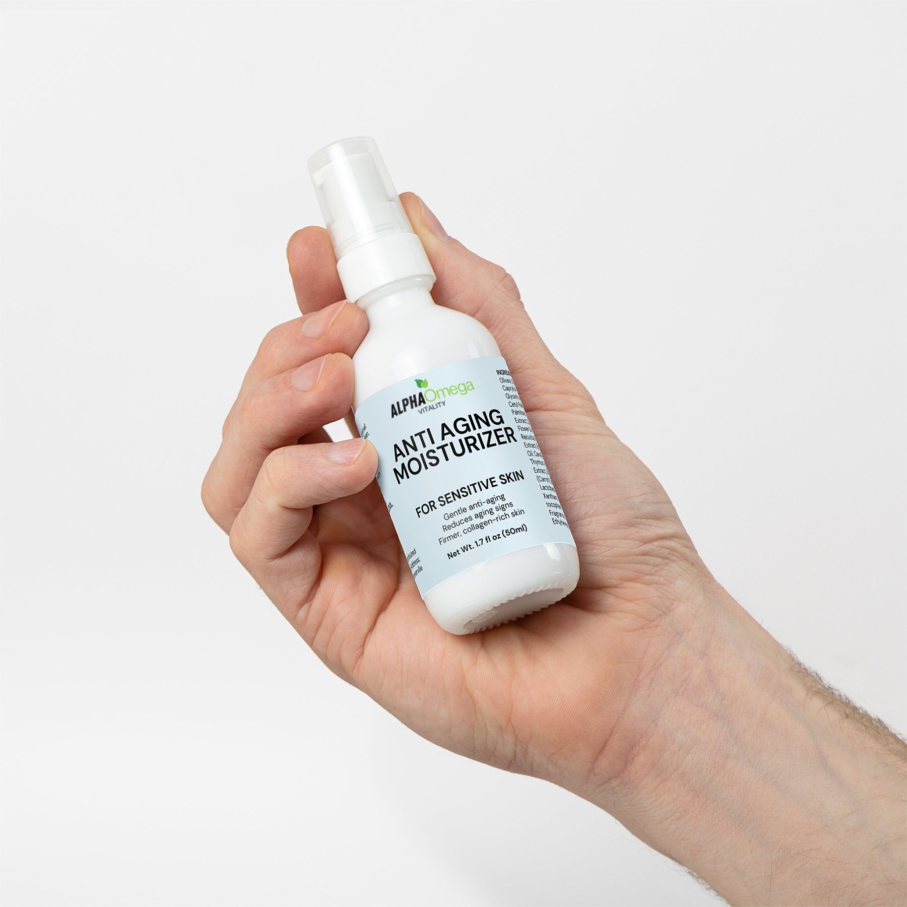 Hand holding Alpha Omega Vitality anti aging moisturizer for sensitive skin in a spray bottle